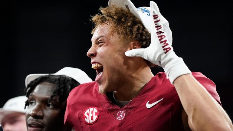 Alabama wide receiver Jermaine Burton (3) celebrates after a win...