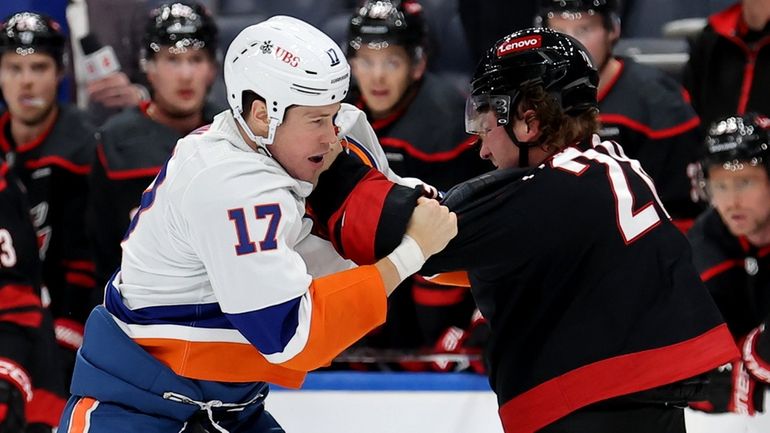 New York Islanders left wing Matt Martin fights Carolina Hurricanes left...