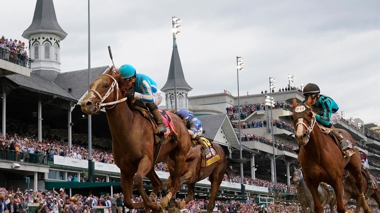 Mage (8), with Javier Castellano aboard, wins the 149th running...