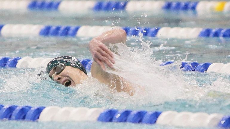 Garden City's Jake Newmark wins the 200 freestyle during the...