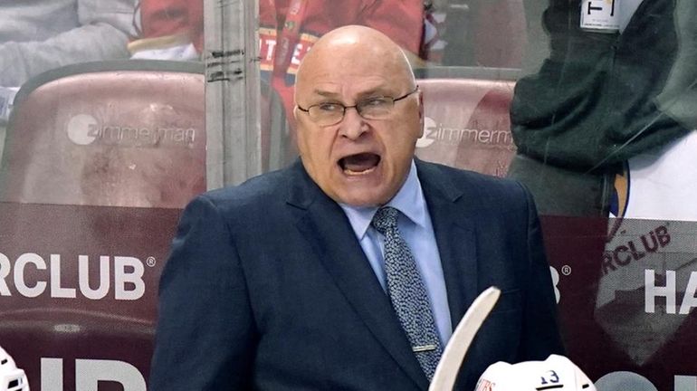 Islanders head coach Barry Trotz watches during the third period...