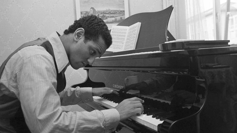 Andre Watts, 16, performs the Liszt piano concerto No. 1...