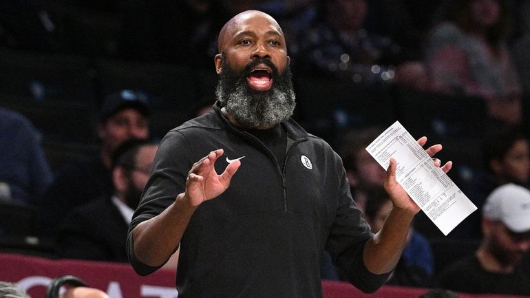 Nets head coach Jacque Vaughn reacts during the first half...