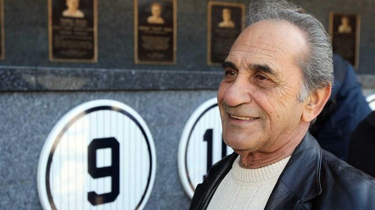 Sal Durante looks on in monument park next to the...