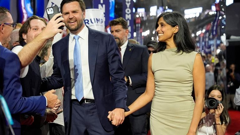 Republican vice presidential candidate Sen. JD Vance, R-Ohio, and his...