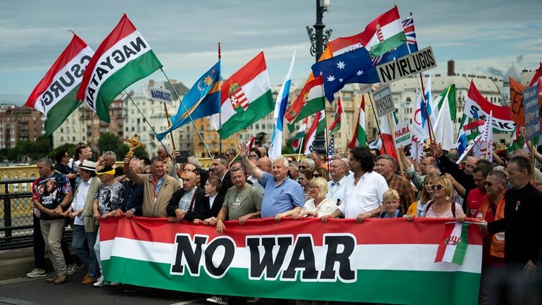 People march during a rally in support of Hungary's Prime...