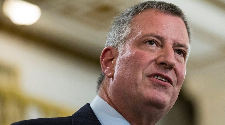 New York City Mayor Bill de Blasio signed a bill...