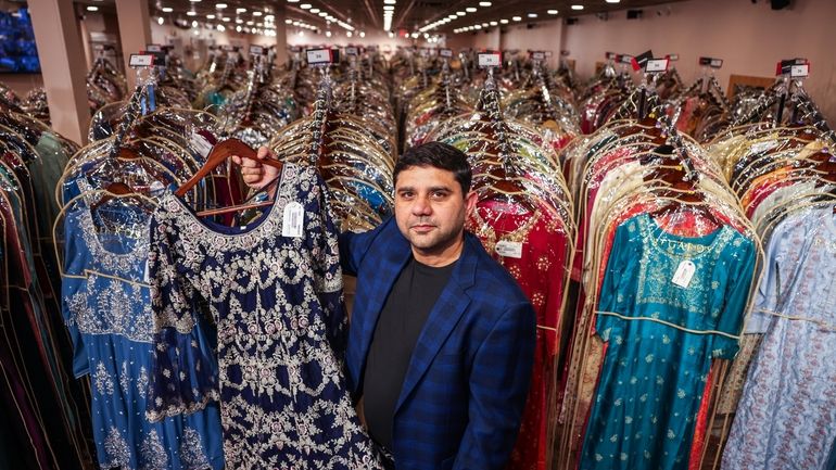 Vikas Chopra, owner of Regards Wholesale Indian Clothing Co. in...