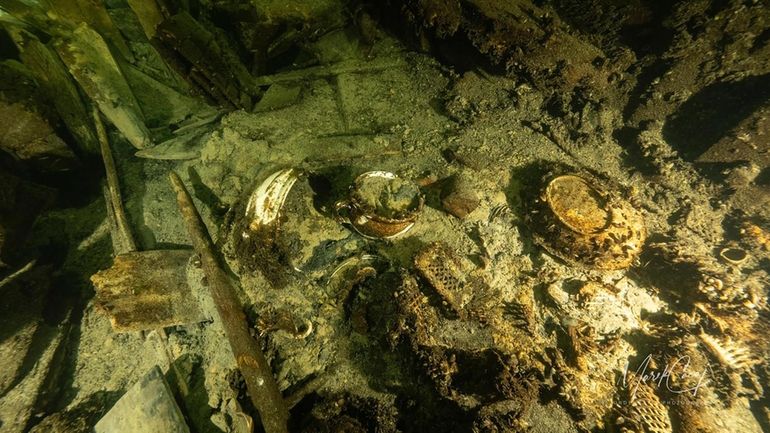 Porcelain items in a 19th century sailing ship wreckage that...