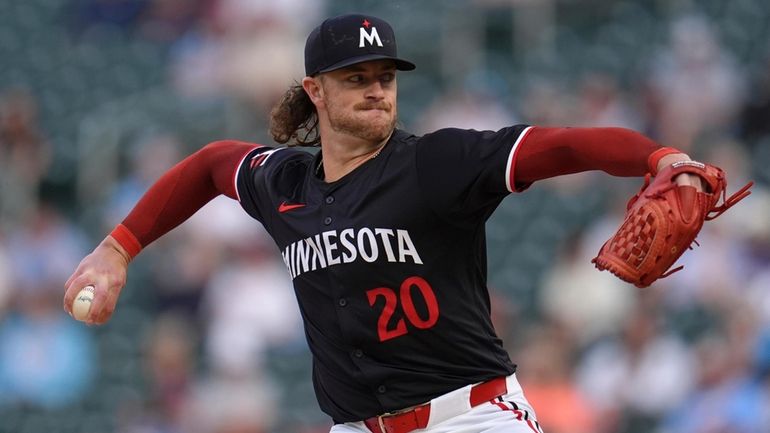 Minnesota Twins starting pitcher Chris Paddack delivers during the third...