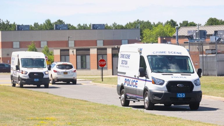 Police at the scene of the incident at  Eastern Suffolk...