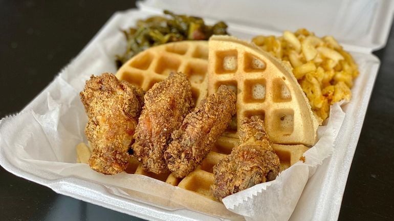 Fried chicken wings and waffles are the main event at...