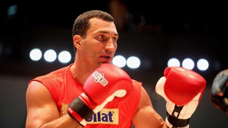 Wladimir Klitschko of Ukraine works out during a public training...