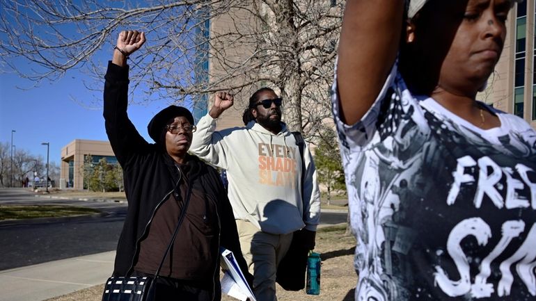 Sheneen McClain, left, the mother of Elijah McClain, and a...