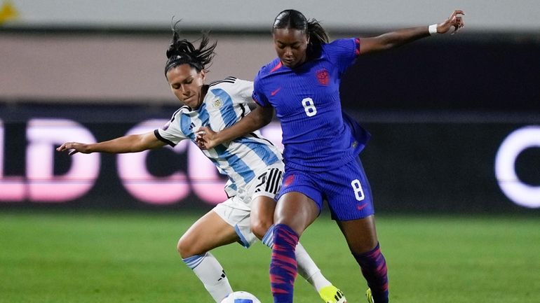 United States forward Jaedyn Shaw, right, and Argentina defender Eliana...