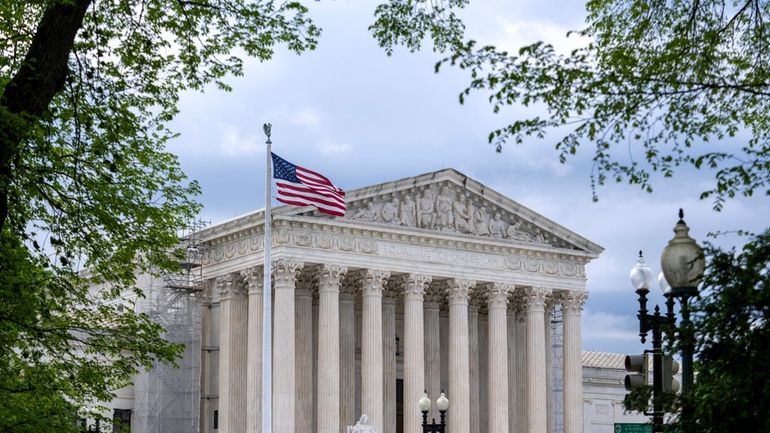 Supreme Court is seen on Capitol Hill in Washington, April...