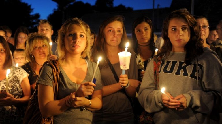 East Northport residents held a candlelight vigil for Ann Pabo...