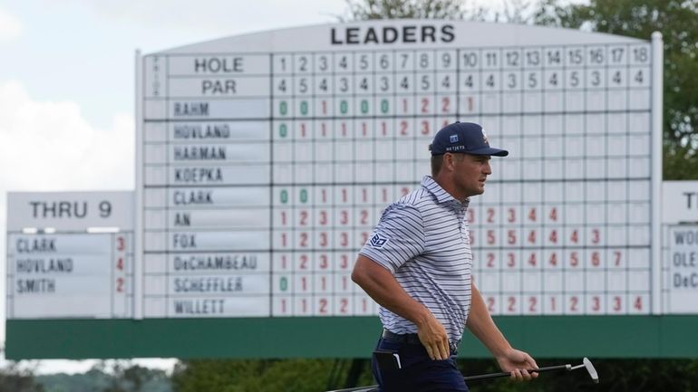 Bryson DeChambeau walks on the 17th green during the first...