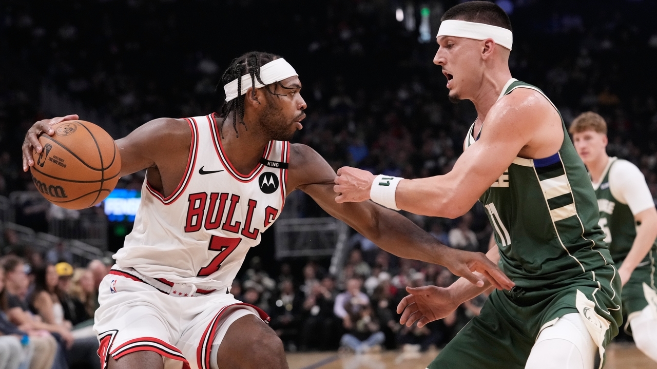 Powell scores 25 points to help the Bulls hold off the Bucks, 132-125 ...