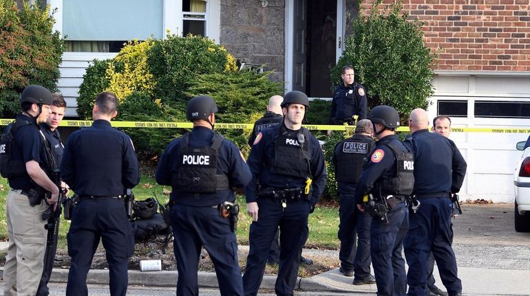 Nassau County police at the scene of an apparent homicide-suicide...