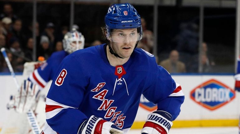 Jacob Trouba #8 of the Rangers skates against the Washington Capitals...