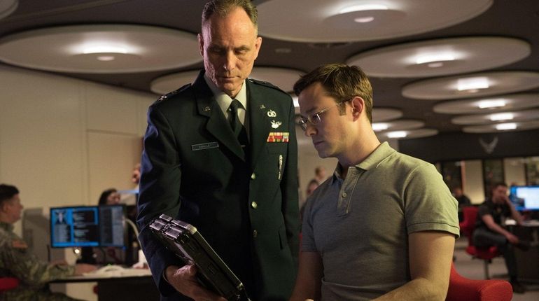 Joseph Gordon-Levitt, right, plays the title NSA whistleblower in "Snowden."