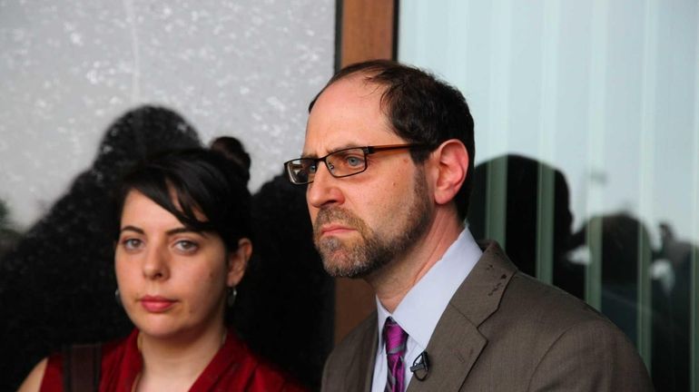 Jesse Friedman and his wife, Lisabeth, hold a news conference...