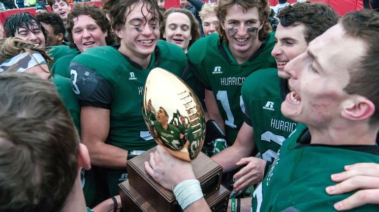 Westhampton's Dylan Laube and his teammates with the Long Island...