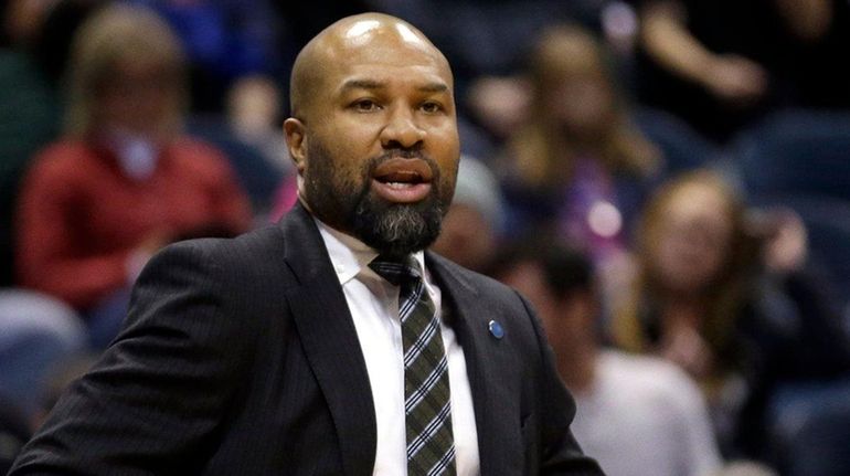 Knicks coach Derek Fisher gestures during the first half of...