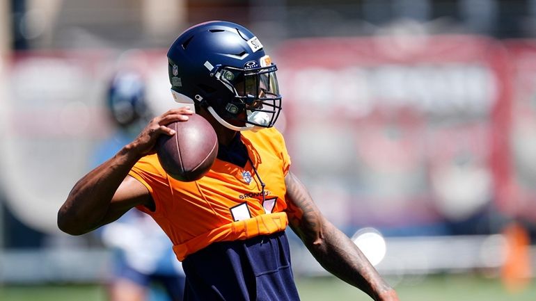 Denver Broncos wide receiver Courtland Sutton takes part in drills...