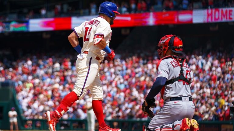 Kyle Schwarber and Aaron Nola lead the way as Phillies bounce back to slam  Cubs, 12-3