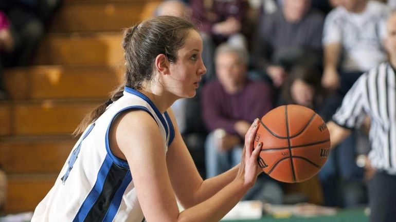 John Glenn's #14 Allison McKenna takes a foul shot during...