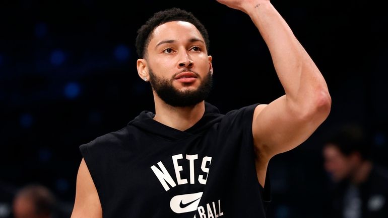 Nets guard Ben Simmons warms up before game against the...