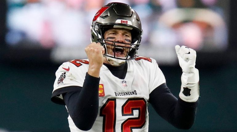 Buccaneers quarterback Tom Brady reacts after winning the NFC Championship...