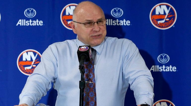 Islanders head coach Barry Trotz talks with the media after earning his...