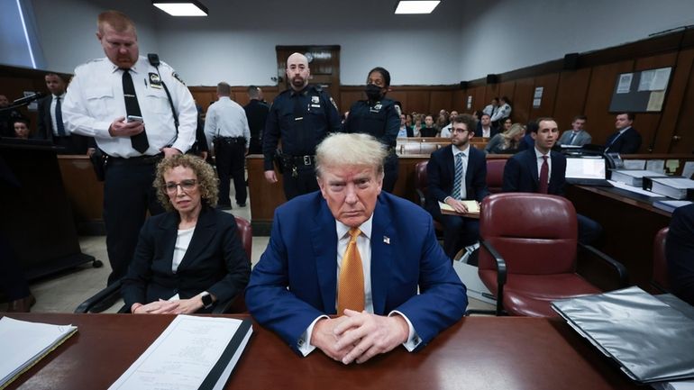 Former President Donald Trump and attorney Susan Necheles attend his...