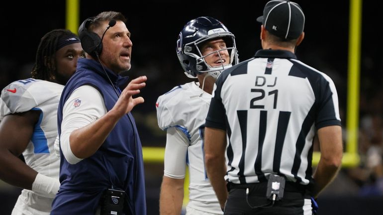 Tennessee Titans head coach Mike Vrabel, left, and quarterback Ryan...