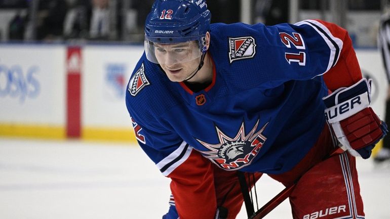 Rangers right wing Julien Gauthier sets before a face off...