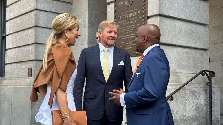 King Willem-Alexander, center, and Queen Maxima of the Netherlands are...