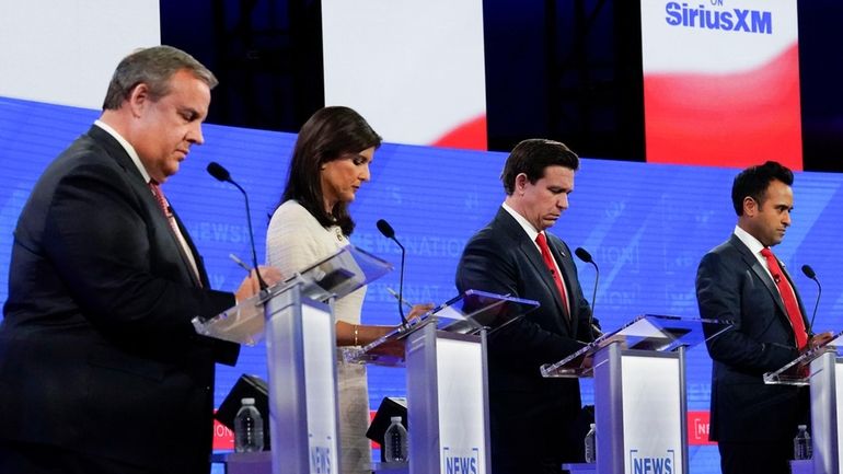 Republican presidential candidates from left, former New Jersey Gov. Chris...