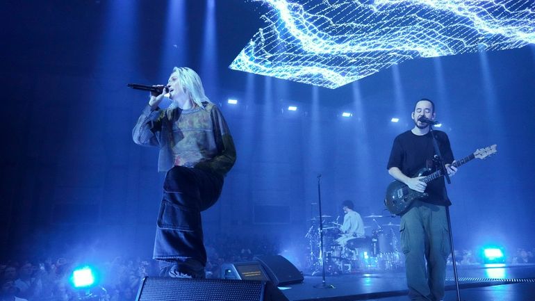 Emily Armstrong, from left, Colin Brittain, and Mike Shinoda of...