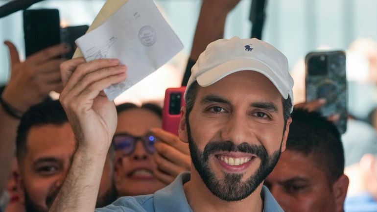 El Salvador President Nayib Bukele, who is seeking re-election, votes...