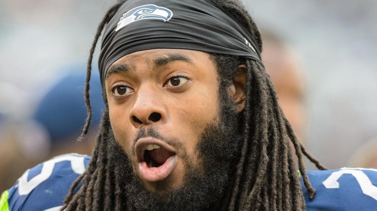 Seattle Seahawks corner back Richard Sherman (25) celebrates after the  Seahawks stopped the New England Patriots in the final seconds of the  fourth quarter at Gillette Stadium in Foxborough, Massachusetts on November