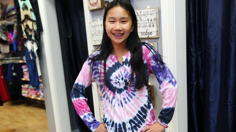 Molly Garfinkel, 12, Port Washington, models an outfit from Bluetique...