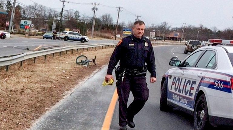 Suffolk police investigate a crash involving a bicyclist in Holbrook...