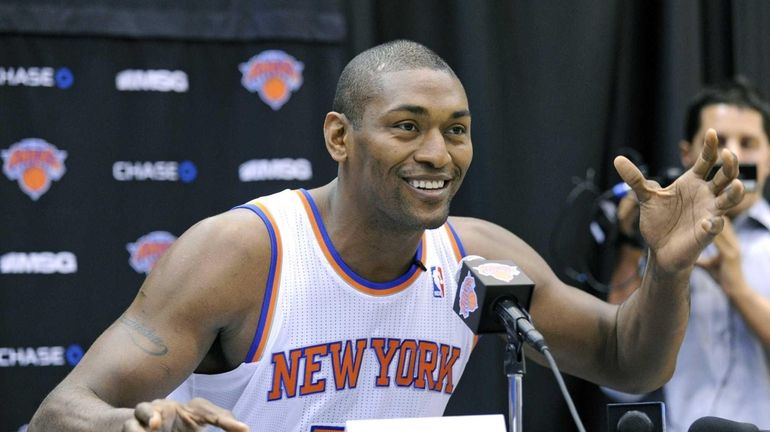 Knicks forward Metta World Peace speaks at a press conference....