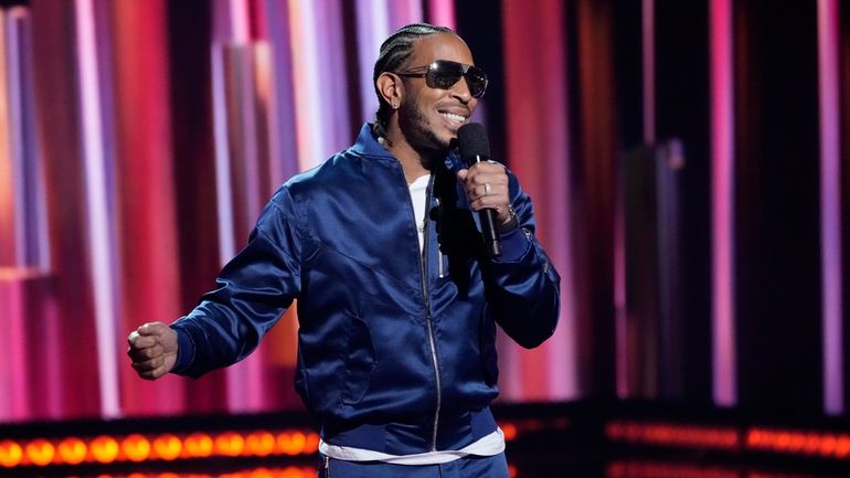 Host Ludacris speaks from the stage during the iHeartRadio Music...