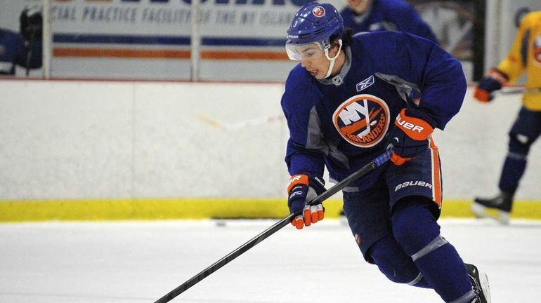 Travis Hamonic skates during the New York Islanders training camp....