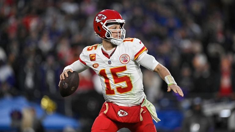 Kansas City Chiefs quarterback Patrick Mahomes (15) throws a pass...