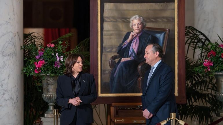 Vice President Kamala Harris, left, and first gentleman Doug Emhoff...